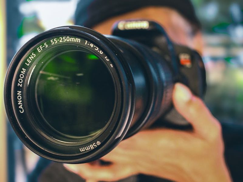 Close up of eye looking through a lens